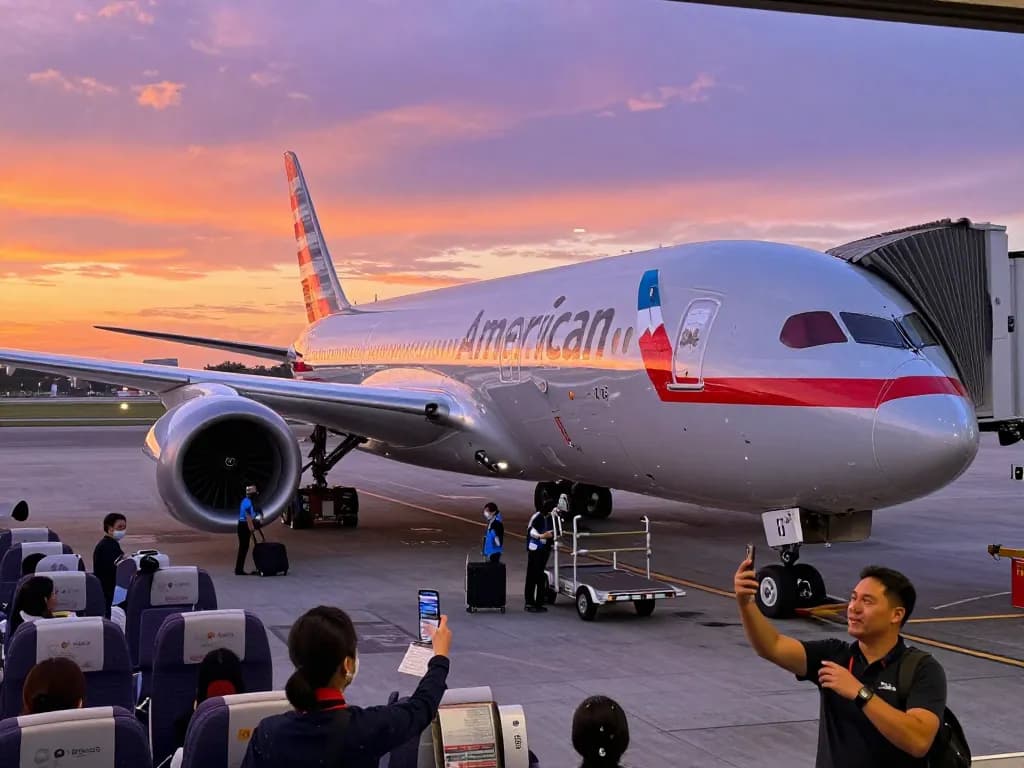 Explore the excitement of boarding an American Airlines Boeing 789P during sunset at the airport.